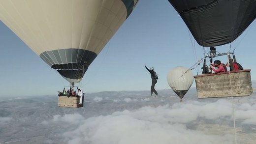 Video of the Week - Daredevils Attempt Tightrope Walk Between Two Hot Air Balloons!